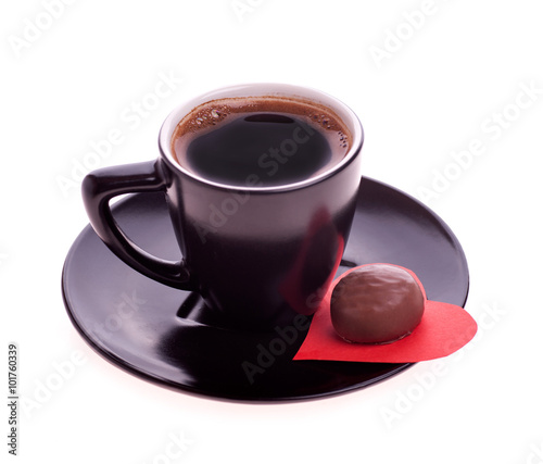 chocolate candy at the heart of paper and coffee black