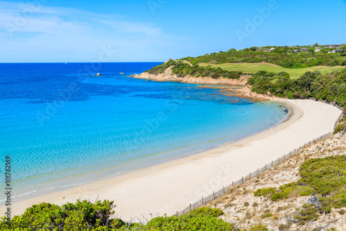 A view of beautiful white sand beach Grande Sperone with azure sea water, Corsica island, France © pkazmierczak