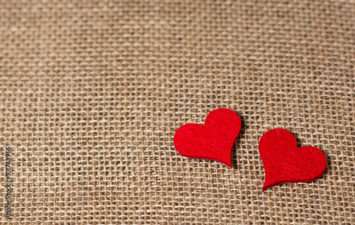 Two red hearts piece of fabric