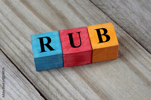 RUB (Russian Ruble) sign on colorful wooden cubes