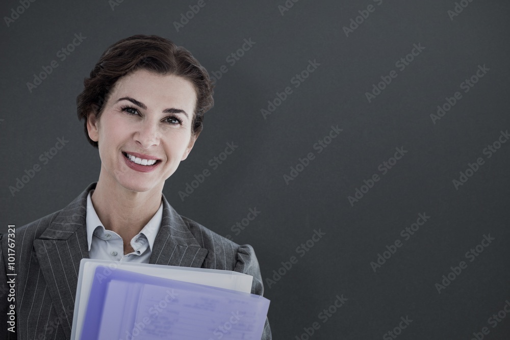 Φωτογραφία Portrait of beautiful businesswoman with files in arms
