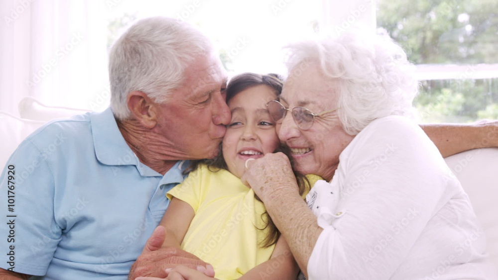 Happy grandparents with granddaughter Happy grandparents with granddaughter