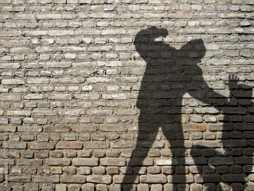 Shadow of Men in Fight photo