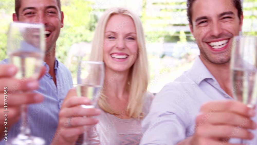 Happy friends toasting with champagne Happy friends toasting with champagne