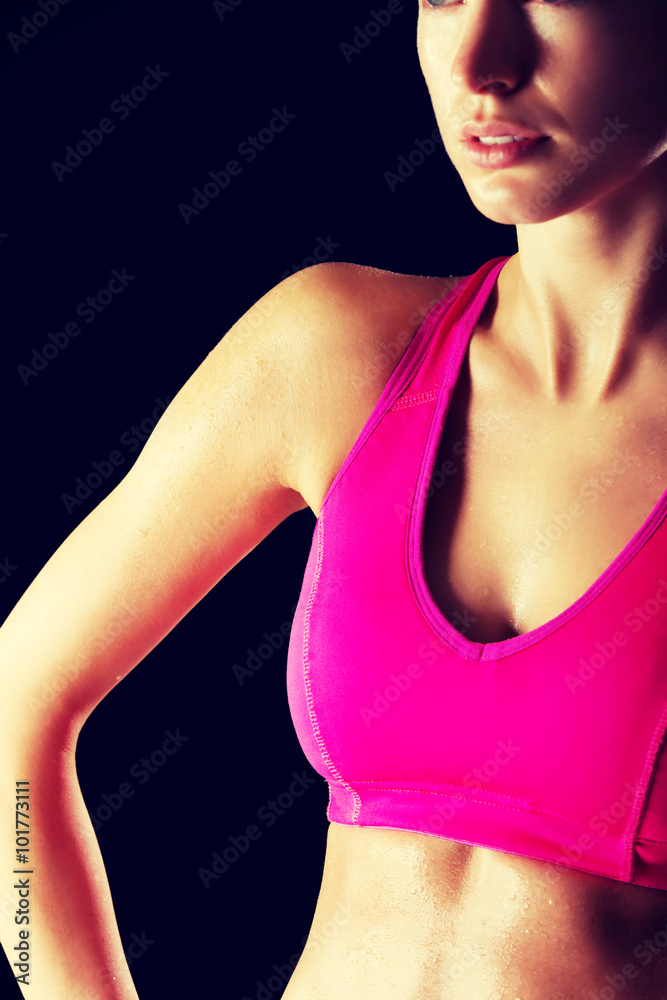 Athletic young woman on the gym