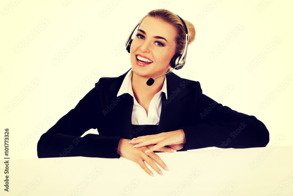 Smille call center woman holding empty banner. Smille call center woman holding empty banner.