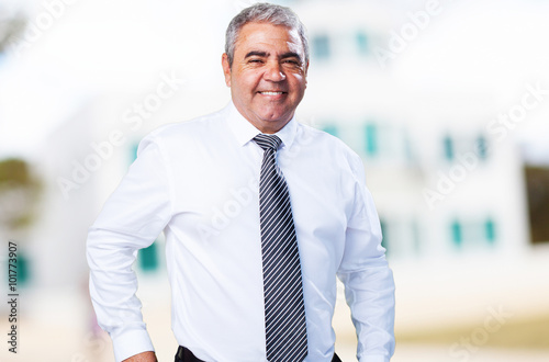 mature business man holding a wallet