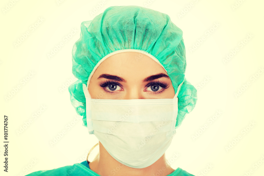 Female surgeon doctor in protective mask Female surgeon doctor in protective mask