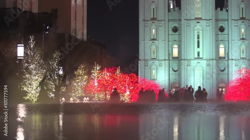 Families mill around the Christmas lights at Temple Square in downtown Salt Lake City, UT.