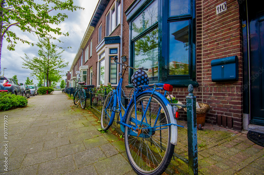 Fototapeta premium Harlem, Amsterdam, Netherlands - July 14, 2015: Charming parking for bikes