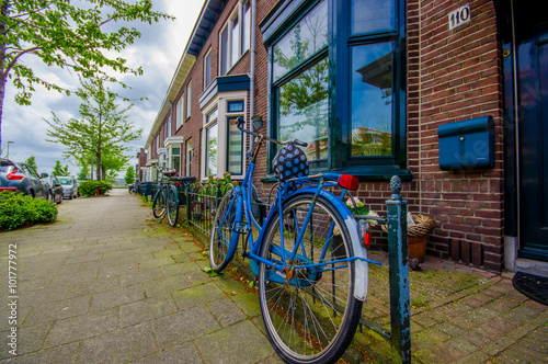 Harlem, Amsterdam, Netherlands - July 14, 2015: Charming parking for bikes photo
