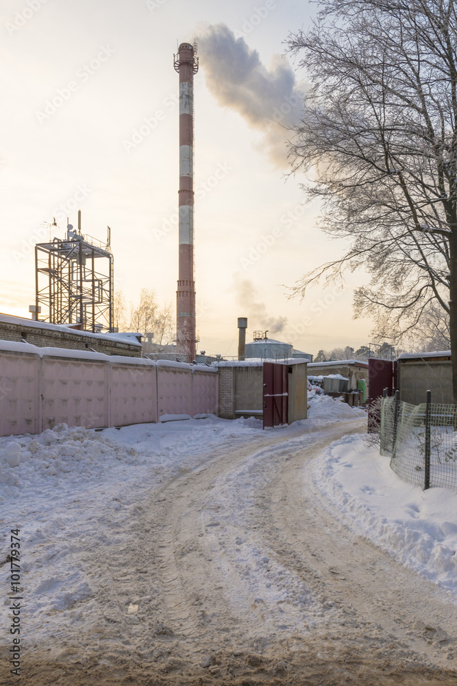 Smoke from factory chimneys in the winter cold day in Russia Smoke from factory chimneys in the winter cold day in Russia