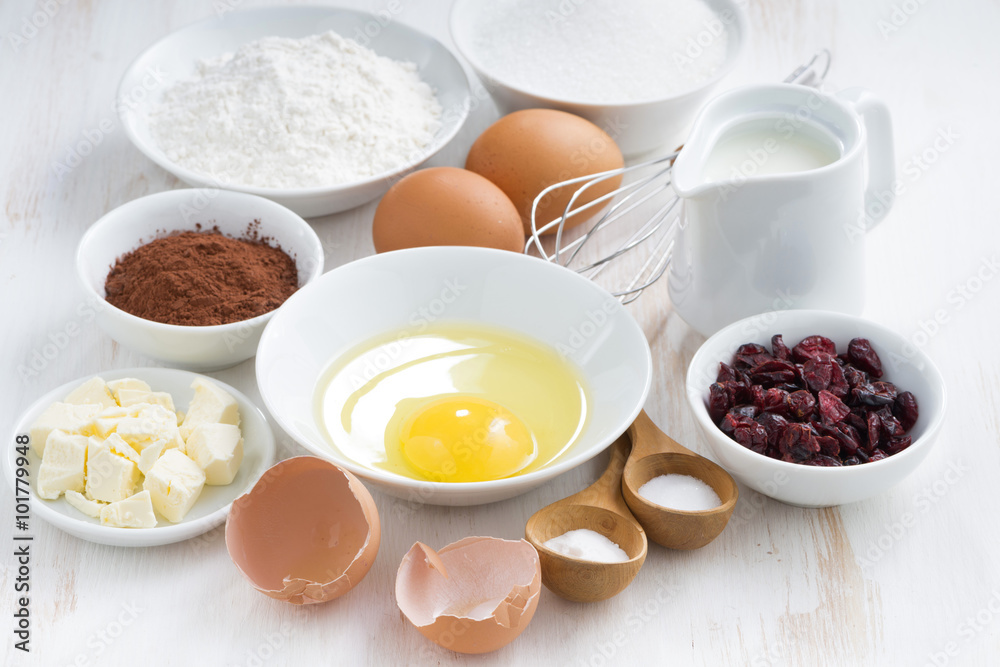 fresh ingredients for baking on a white table fresh ingredients for baking on a white table