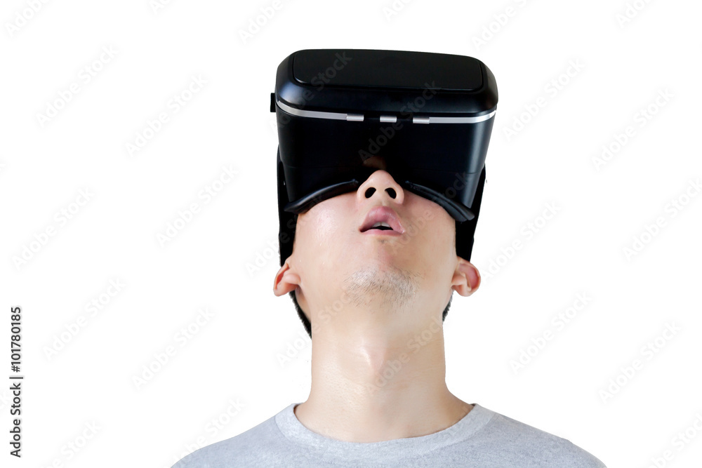 Asian man wearing VR goggle and immersing himself in VR multimedia in white isolated and clipping mask. Asian man wearing VR goggle and immersing himself in VR multimedia in white isolated and clipping mask.