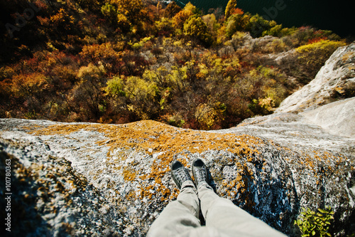 Standing on the cliff. Thinking of committing suicide, depressio photo