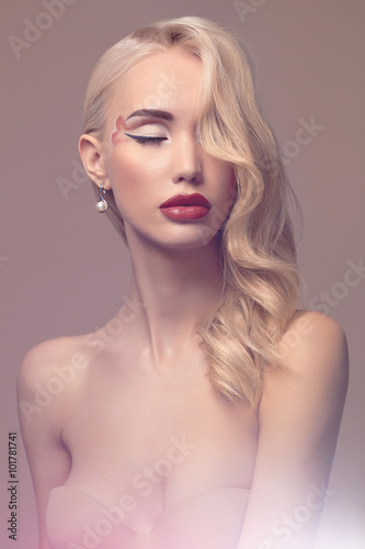 beautiful blond young woman with make-up