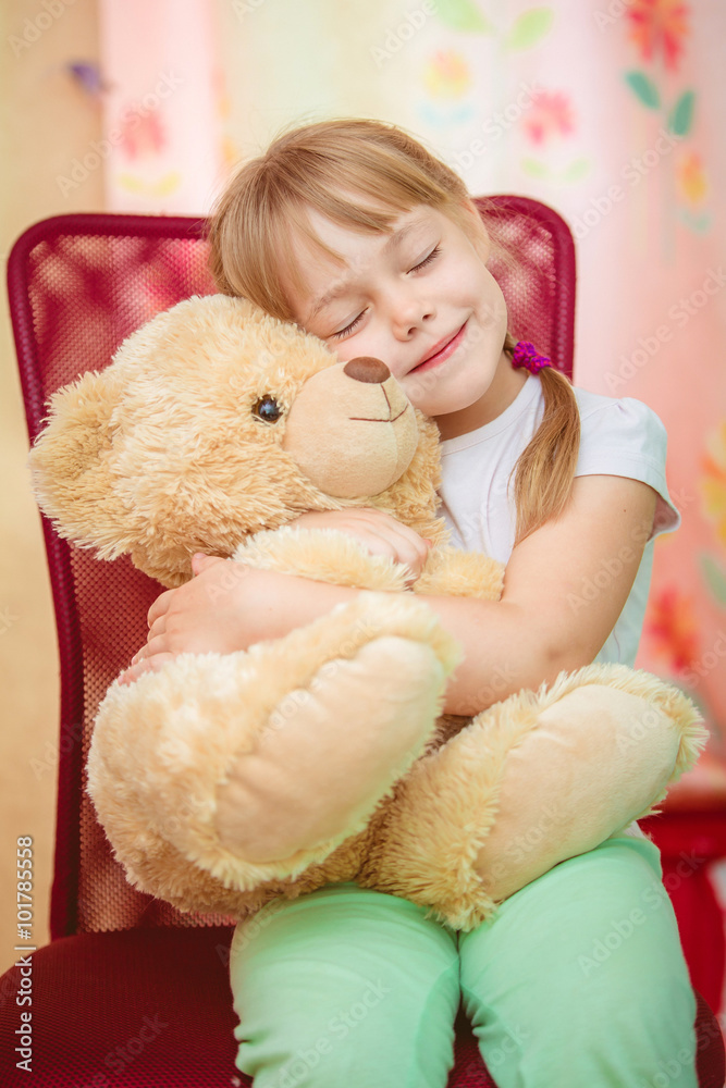 Girl hugging a teddy bear hot sale