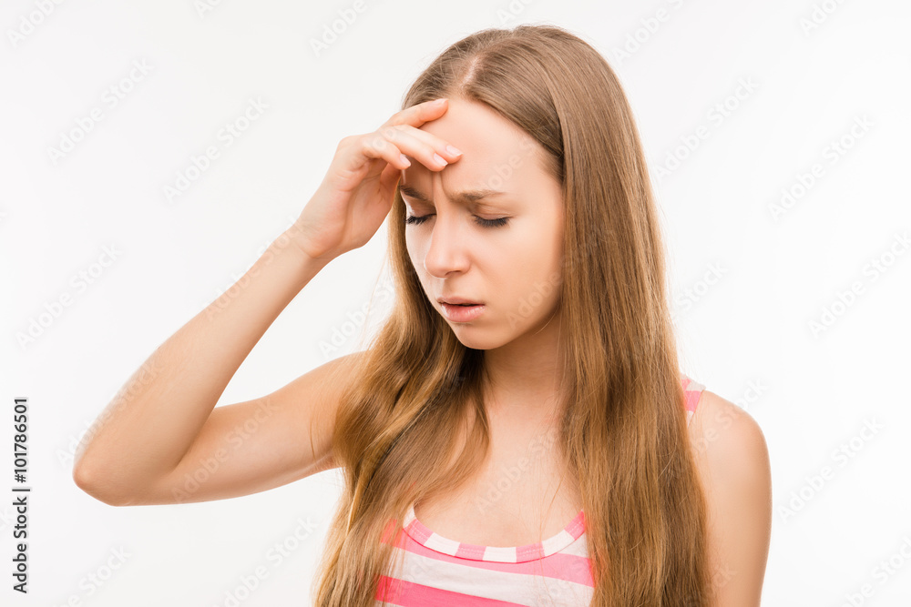 A beautiful young sad girl in a bad mood