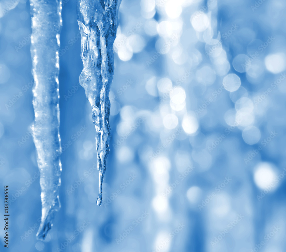 Bright spring background with icicles in the sunlight Bright spring background with icicles in the sunlight