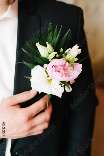 Pinning a Boutonniere