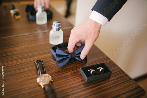 Groom is preparing for his wedding