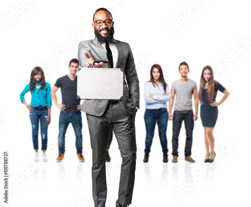full body business black man holding a suitcase