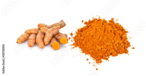 turmeric powder with turmeric root isolated on white