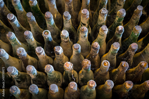 Many old wine bottles top view