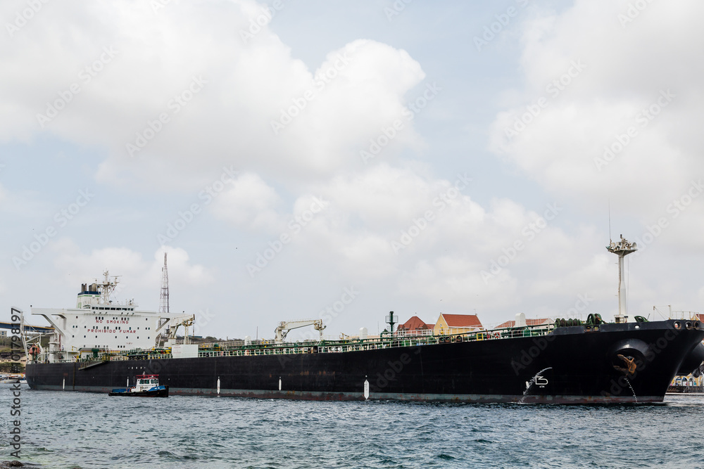 Massive Tanker Leaving Curacao with Tug