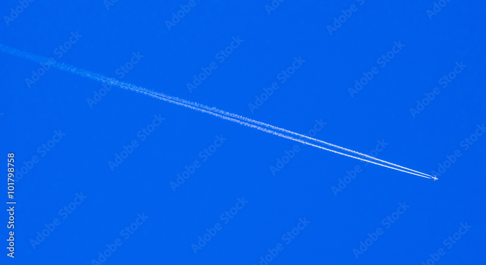 Cloud and jet contrail with blue sky Cloud and jet contrail with blue sky