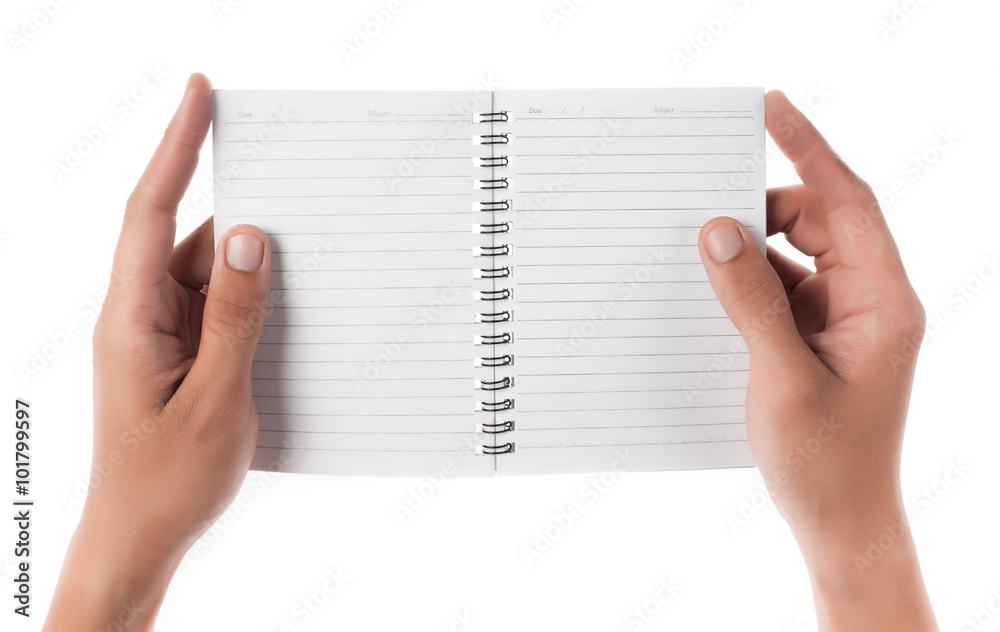 Hand holding an empty notepad (notebook) isolated on white