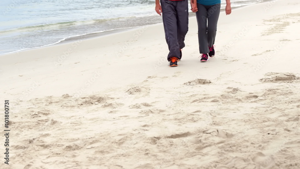 Couple holding hands and walking Couple holding hands and walking
