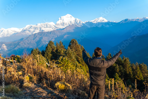 Hiker enjoying the views of the Himalayan mountains