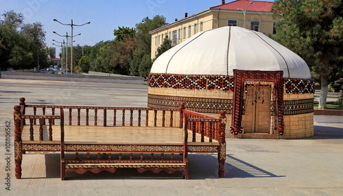 Ethnic nomadic yurt-building and trestle-bed, built for the cele photo