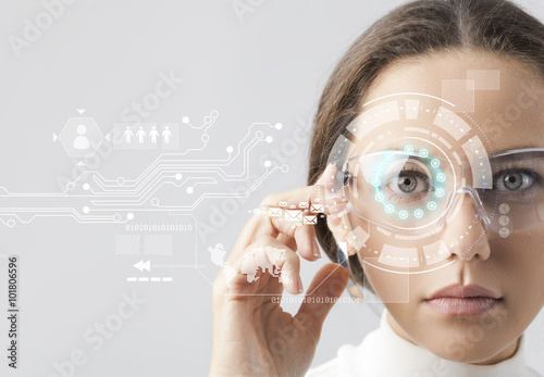 Woman wearing futuristic smart glasses