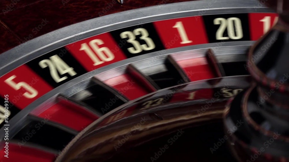 Roulette wheel starts running with white ball Roulette wheel starts running with white ball