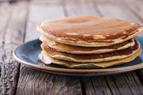 Pancake folded stack on wooden background.selective focus.