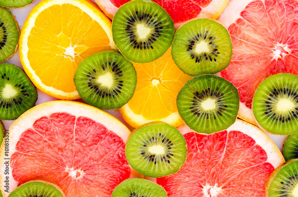 Naklejka Jaskrawy tło z kiwi owoc, grapefruitowym i pomarańczami