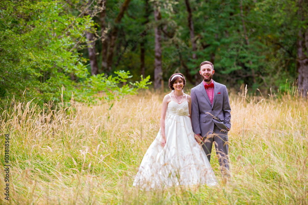 Bride and Groom in Field