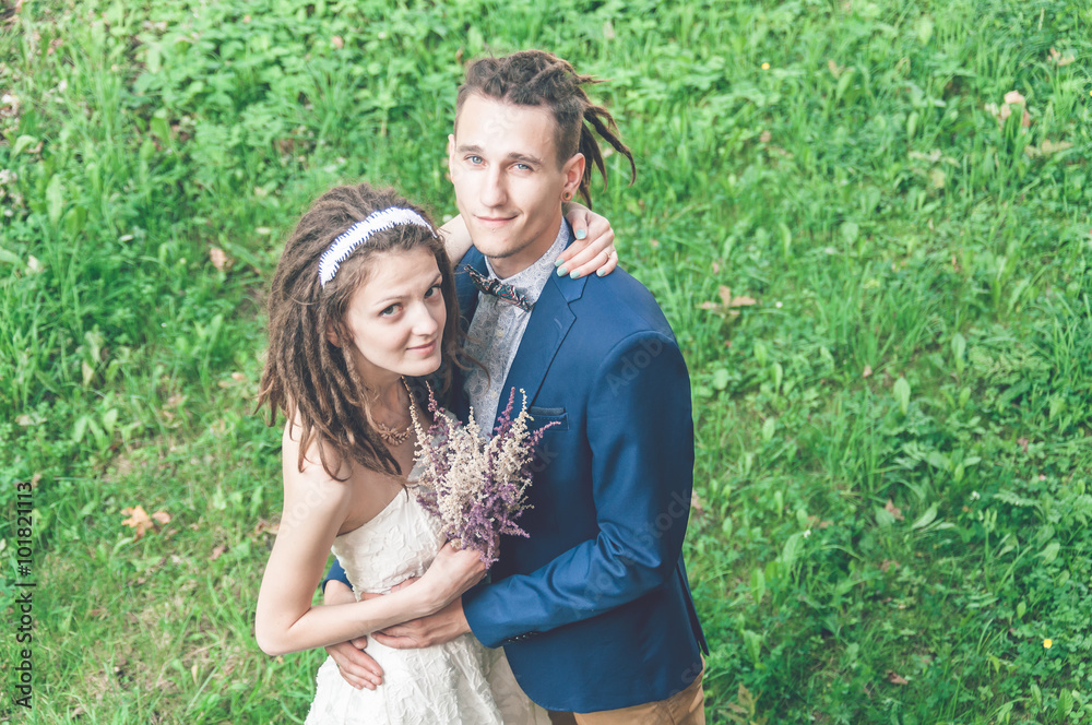The couple with dreadlocks posing The couple with dreadlocks posing
