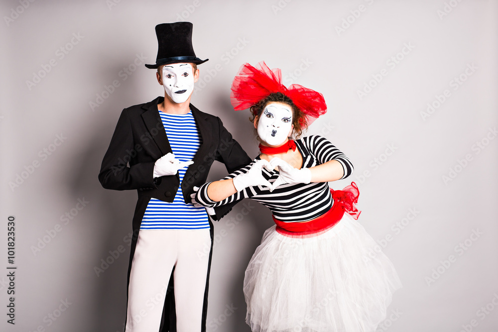 Two mime, pantomime heart, valentine day concept, April Fools Day concept Two mime, pantomime heart, valentine day concept, April Fools Day concept