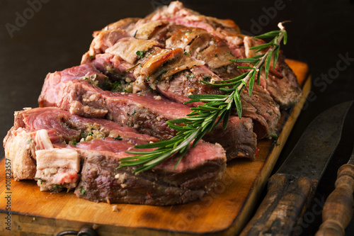 Beef roll stuffed with garlic and rosemary herbs