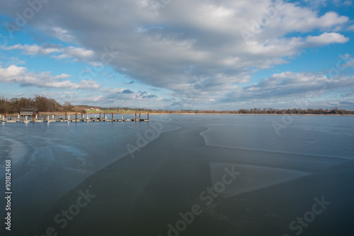new build wooden brige on frozen lake Chiemsee