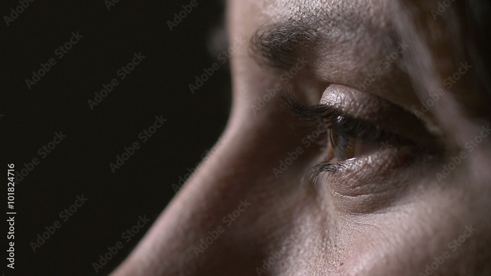 Female eyes with contact lenses opening Female eyes with contact lenses opening