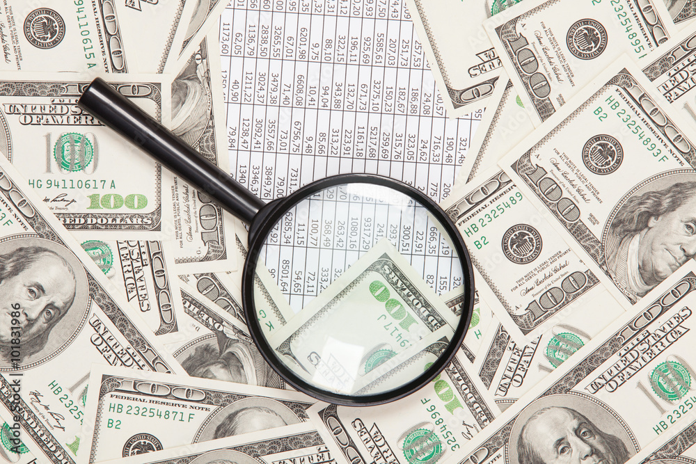 Business background with money american dollars and loupe Business background with money american dollars and loupe