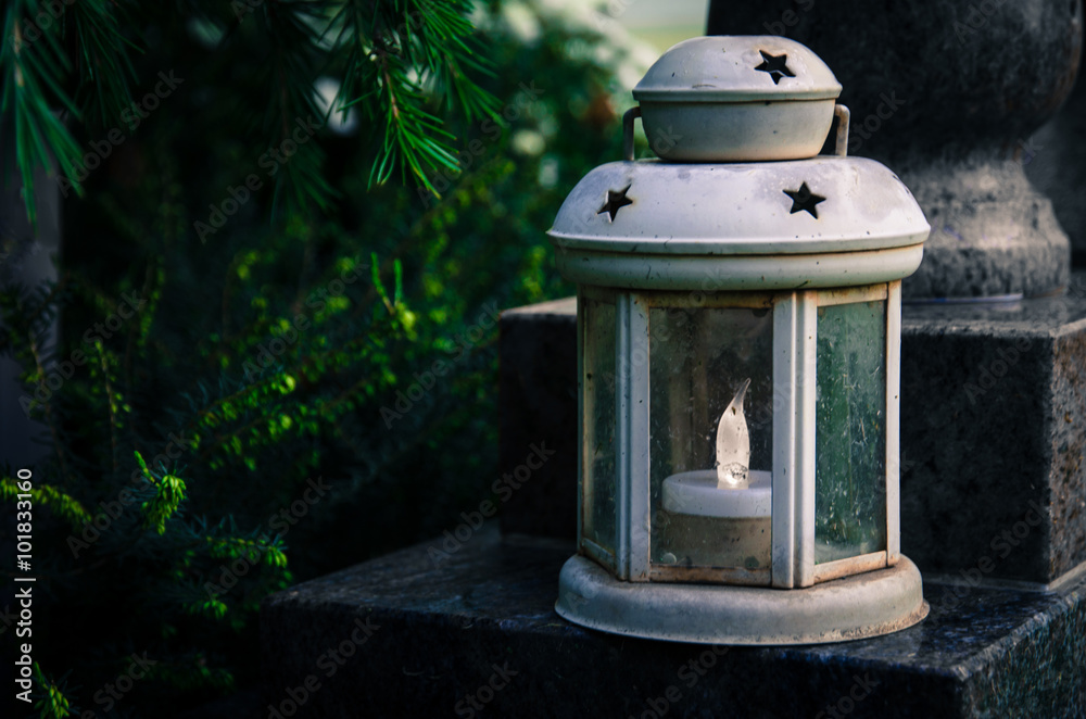 lantern on grave Stock Photo | Adobe Stock