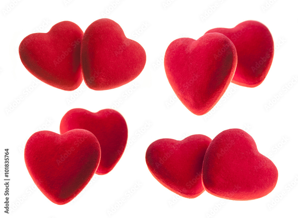 Red velvet hearts isolated on white background.