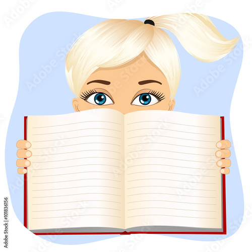 little girl holding a book wide open