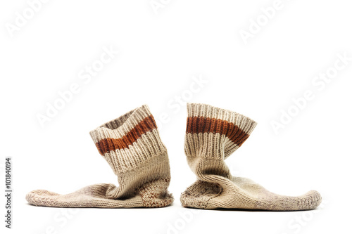 A pair of used socks, isolated on white