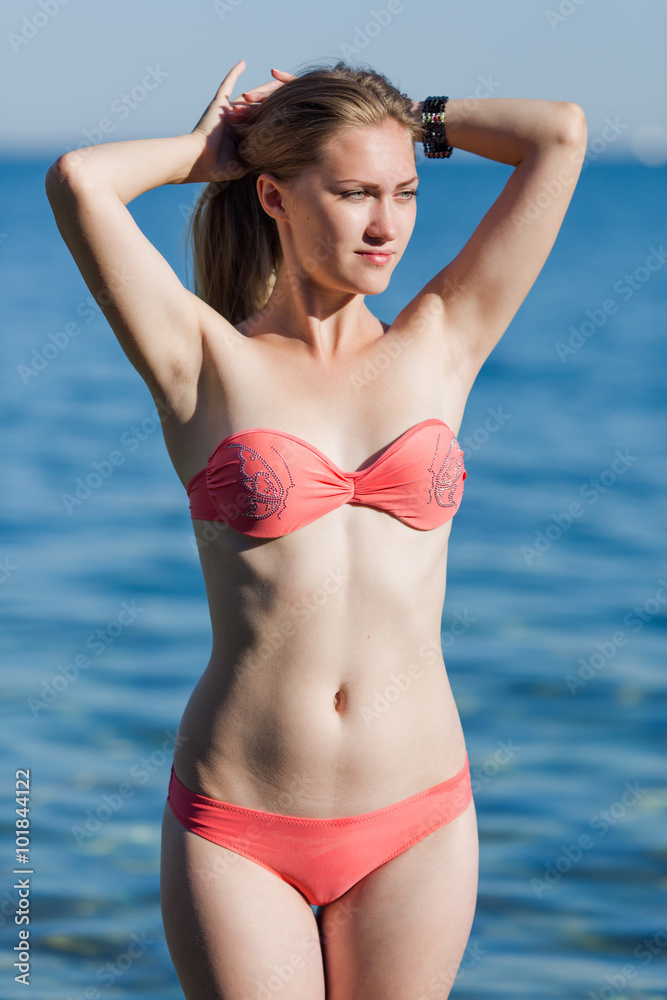 Young woman in pink bikini Stock Photo
